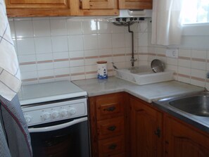 Microwave, coffee/tea maker, cookware/dishes/utensils