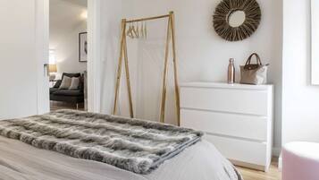 1 bedroom, desk, iron/ironing board, travel crib