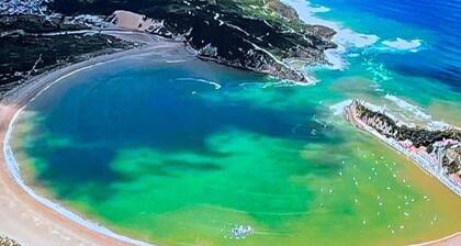 Large architect-designed house with garden & sea view, 3-minute walk from the beach