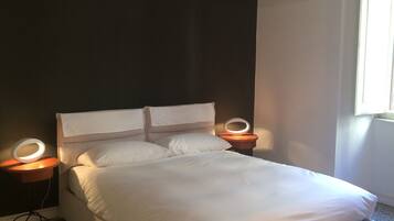 2 slaapkamers, een strijkplank/strijkijzer, gratis wifi, beddengoed