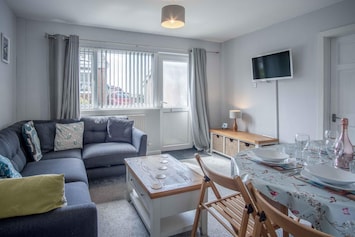 Image of Near Mumbles Cricket Club | Sleeps 4 | Coastal path | Beaches | Parking | WiFi