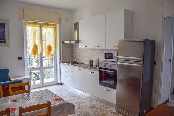 Fridge, microwave, stovetop, high chair