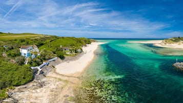 On the beach, sun-loungers, beach towels