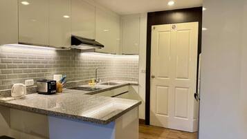 Fridge, microwave, stovetop, electric kettle