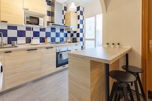 Refrigerador, microondas, horno y lavavajillas 