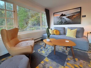 Deluxe Room, 1 King Bed with Sofa bed, Non Smoking, Ocean View (Cape Suite) | Living area | Smart TV, Netflix, pay films - Artisan Suites on Bowen (Bowen Island)