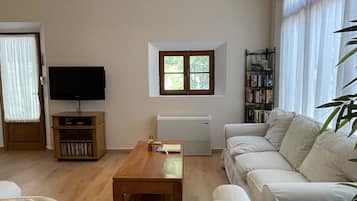 Télévision, lecteur de DVD, livres, vidéothÚque