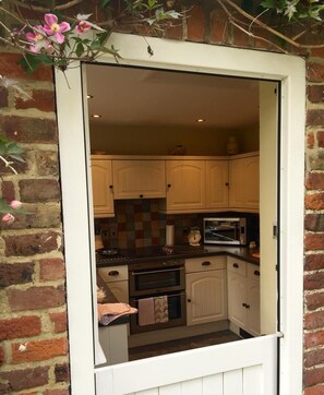 Fridge, microwave, oven, stovetop - Quaint Village Location With Beautiful English Cottage Garden (Deal)