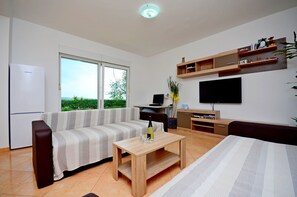 Suite Comfort, 1 camera da letto, vista mare, al piano terra | Tende oscuranti, insonorizzazione, ferro/asse da stiro, Wi-Fi gratuito