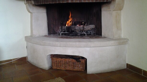 A fireplace with a stone surround and a wooden mantel. - Villa With Pool In St Paul En Foret, Nr Fayence, Cote D'azur-Provence, France (Saint-Paul-En-Forêt)