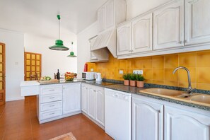 Fridge, microwave, oven, stovetop - Villa Bugambilia is just 50 meters from a long sandy beach. (Muro,)