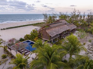 On the beach, sun loungers, beach towels
