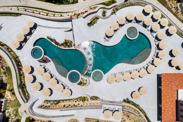 2 outdoor pools, open 8:00 AM to 6:00 PM, pool umbrellas, sun loungers