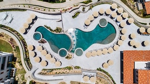 2 outdoor pools, open 8:00 AM to 6:00 PM, pool umbrellas, sun loungers