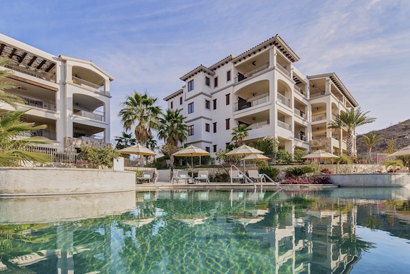 2 outdoor pools, open 8:00 AM to 6:00 PM, pool umbrellas, pool loungers
