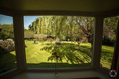 Large Detached Bungalow and Garden Within Village with pubs and shop