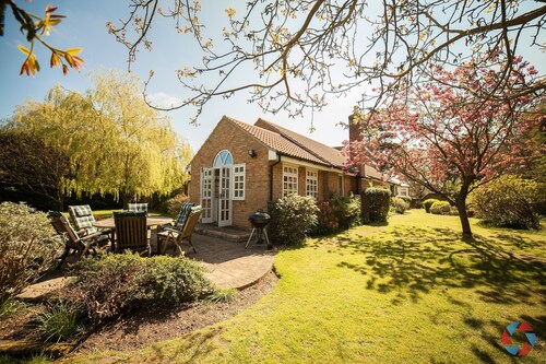 Large Detached Bungalow and Garden Within Village with pubs and shop
