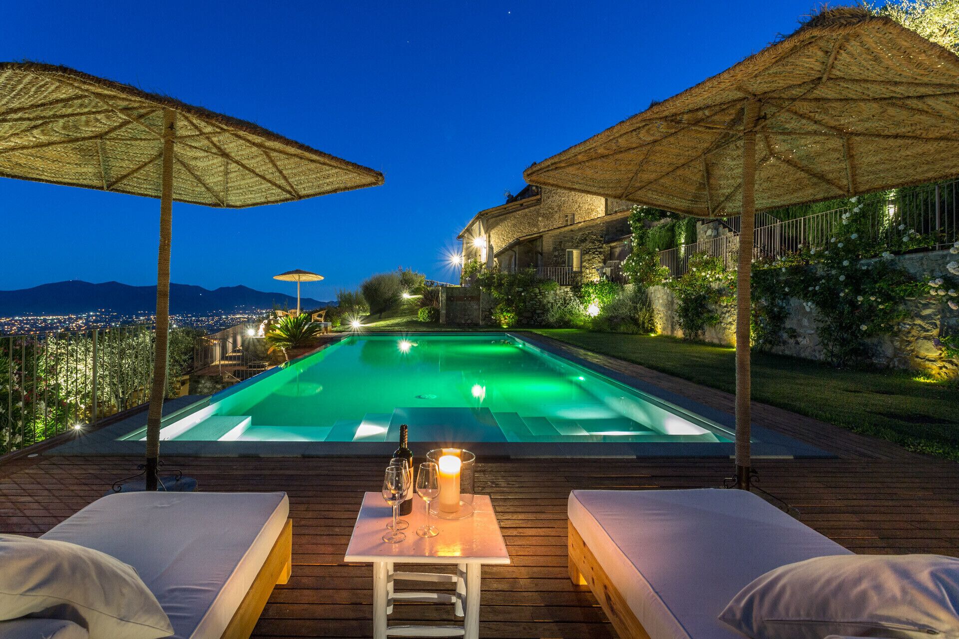 An infinity pool, sun loungers