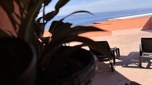 A wooden ceiling and a view of the ocean. - GORGEOUS PENTHOUSE WITH SEA VIEW GIUSI BREATHTAKING ... FREE WIFI INTERNET !!! (Balestrate)