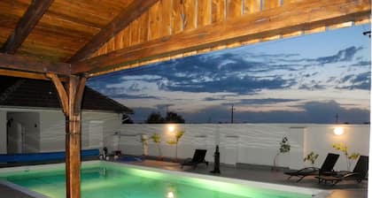 Family-friendly holiday home with heated swimming pool for 11 people + 2 children