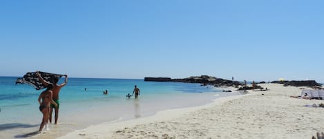 Nära stranden och strandhanddukar