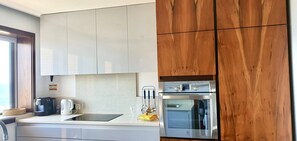 Fridge, microwave, oven, stovetop - Beachfront Apartment - By the SEA (Vila do Conde)