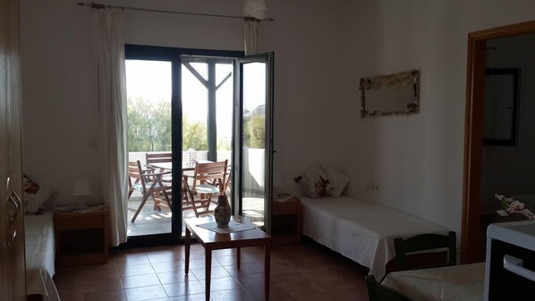 Departamento, 1 habitación | Área de sala de estar | Televisión 