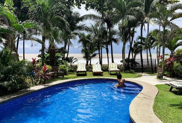 Outdoor pool, open 6:00 AM to 10:00 PM, sun loungers