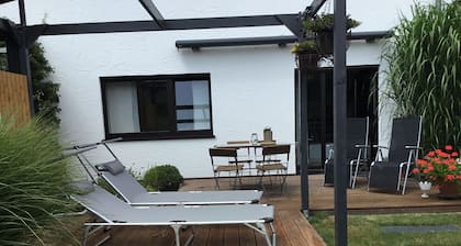 Modern, sunny vacation apartment - quiet location, with large terrace