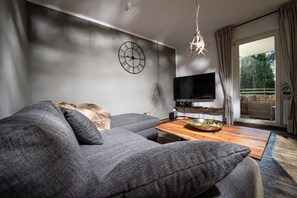 Flat-screen TV, video games, DVD player, stereo