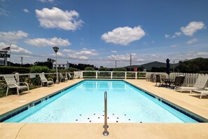 Seasonal outdoor pool, pool umbrellas, sun loungers