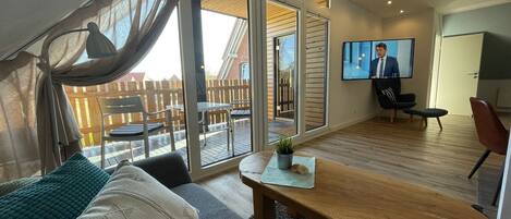 TV, DVD player, books, stereo