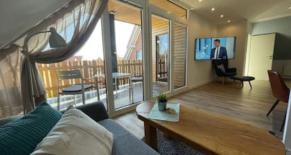 Appartement moderne avec une vue panoramique et un grand balcon