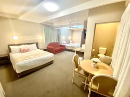 Family Room | In-room safe, desk, laptop workspace, blackout drapes