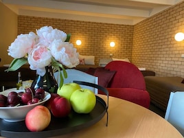 Family Quadruple Room | In-room safe, desk, laptop workspace, blackout drapes