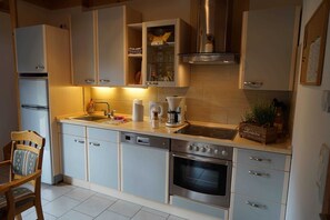 Refrigerador, microondas, horno y lavavajillas 