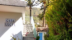 A stone pathway leading to a house with a sign reading "CASA LUCIA". - Small house in a village, with a front yard, set back from the main street, with Wi-Fi (Valle Gran Rey)