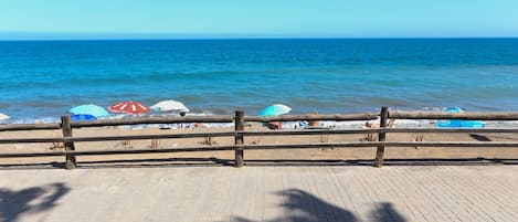 On the beach, sun loungers