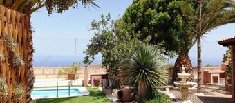 Maison de campagne historique et romantique avec jardin tropical