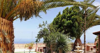 Romantic, historic country house with tropical garden