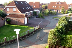 Property grounds - Row corner house, in the middle of Norddeich, quiet location, family friendly, WiFi free (Norden-Norddeich)