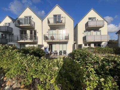 Apartment for 2 people with a large west-facing terrace and a view of the dune