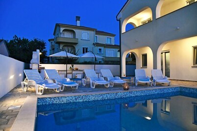 New modern villa with pool, 900 meters from the beach with great sea views