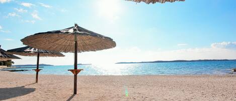 Beach nearby, sun loungers