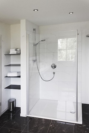 Bathtub, hair dryer, towels