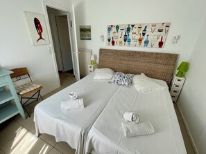 4 عدّة غرف نوم ومكواة/لوح كي وواي فاي مجانًا وملاءات أسرّة