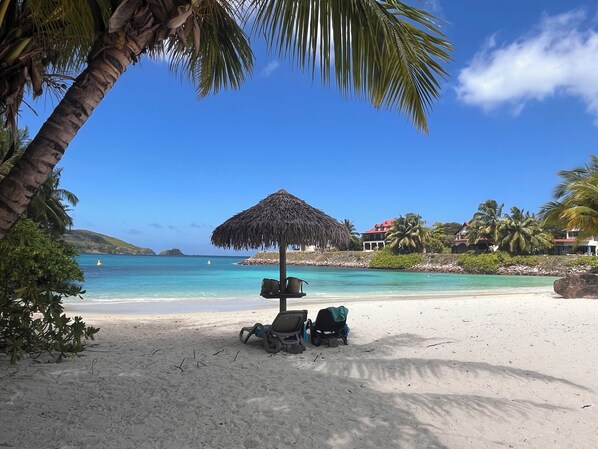 On the beach, sun-loungers, beach towels