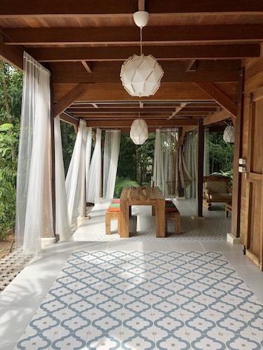 The house is in the middle of Jungle but also 5 minutes walk from the beach