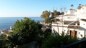 A coastal view with white buildings, a clear sky, and a view of the sea. - Apartment in a beautiful, quiet location with stunning panoramic views across the sea (Velilla-Taramay)