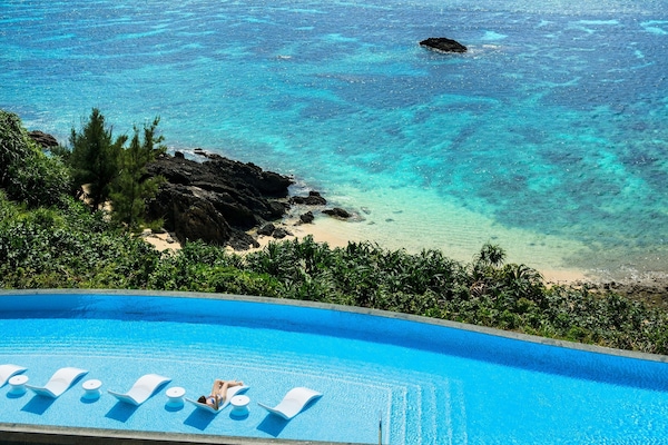 Indoor pool, seasonal outdoor pool, cabanas (surcharge), pool umbrellas